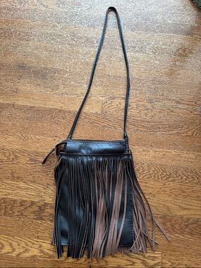 Handmade leather shoulder bag with fringe